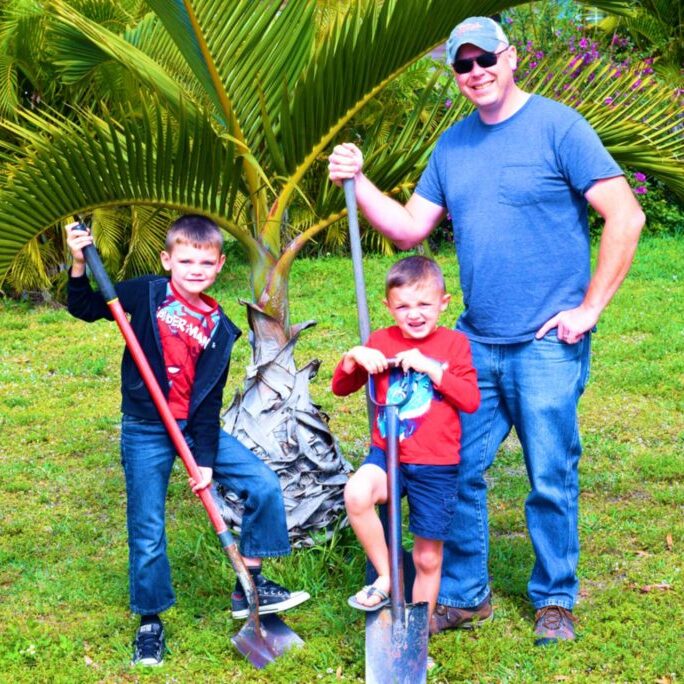 Me and boys planting palms 1
